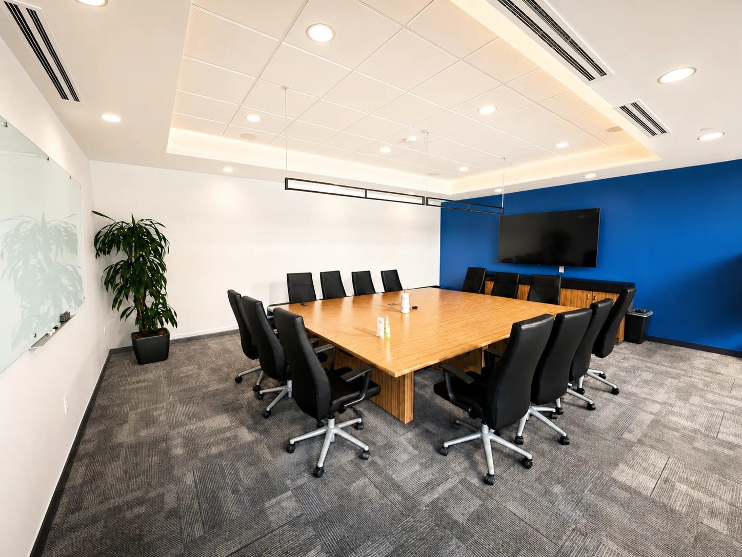 Large boardroom with conference table for fourteen